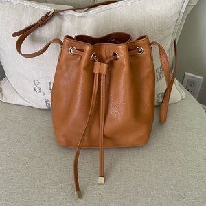 Barneys New York tan leather bucket bag crossbody